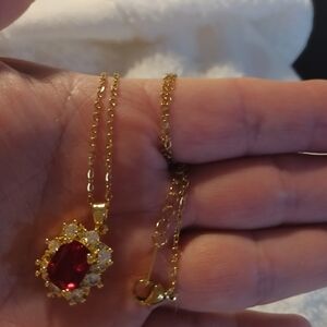 Elegant Gold Necklace with Red Gemstone Pendant